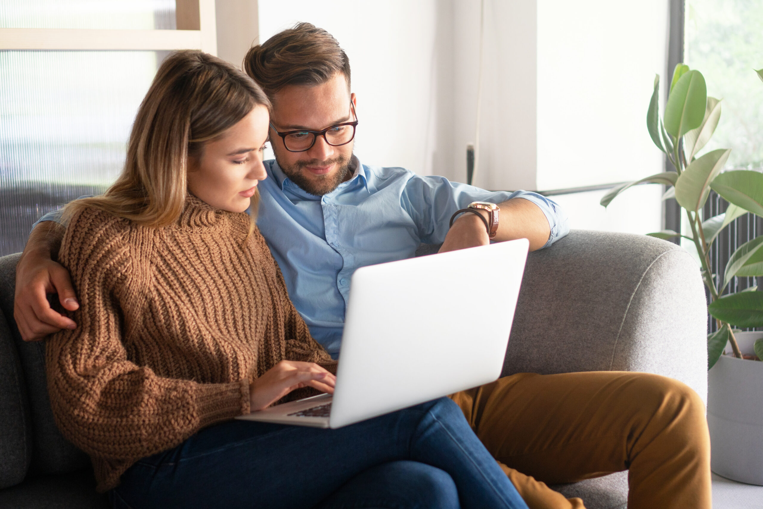 Homeowners comparing propane pricing and learning about a Propane PreBuy Program before winter.